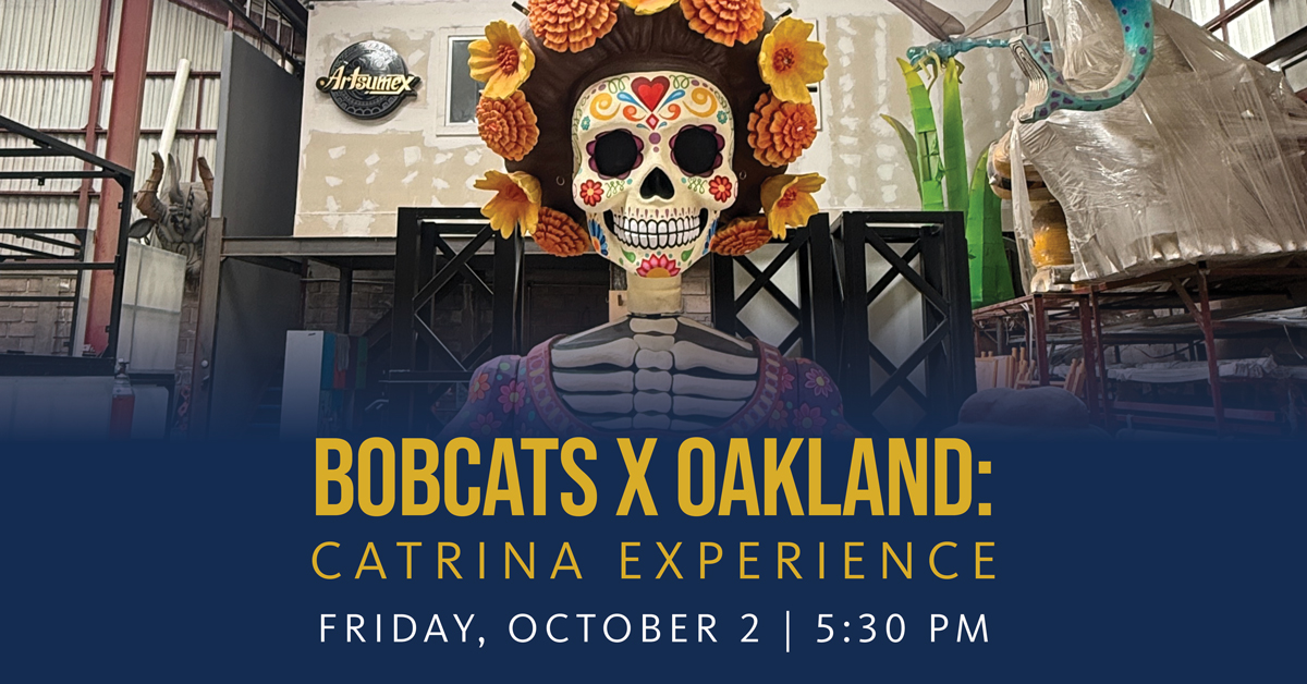Decorative Catrina skull figure adorned with marigold flowers in a workshop setting promoting Bobcats in Oakland event.